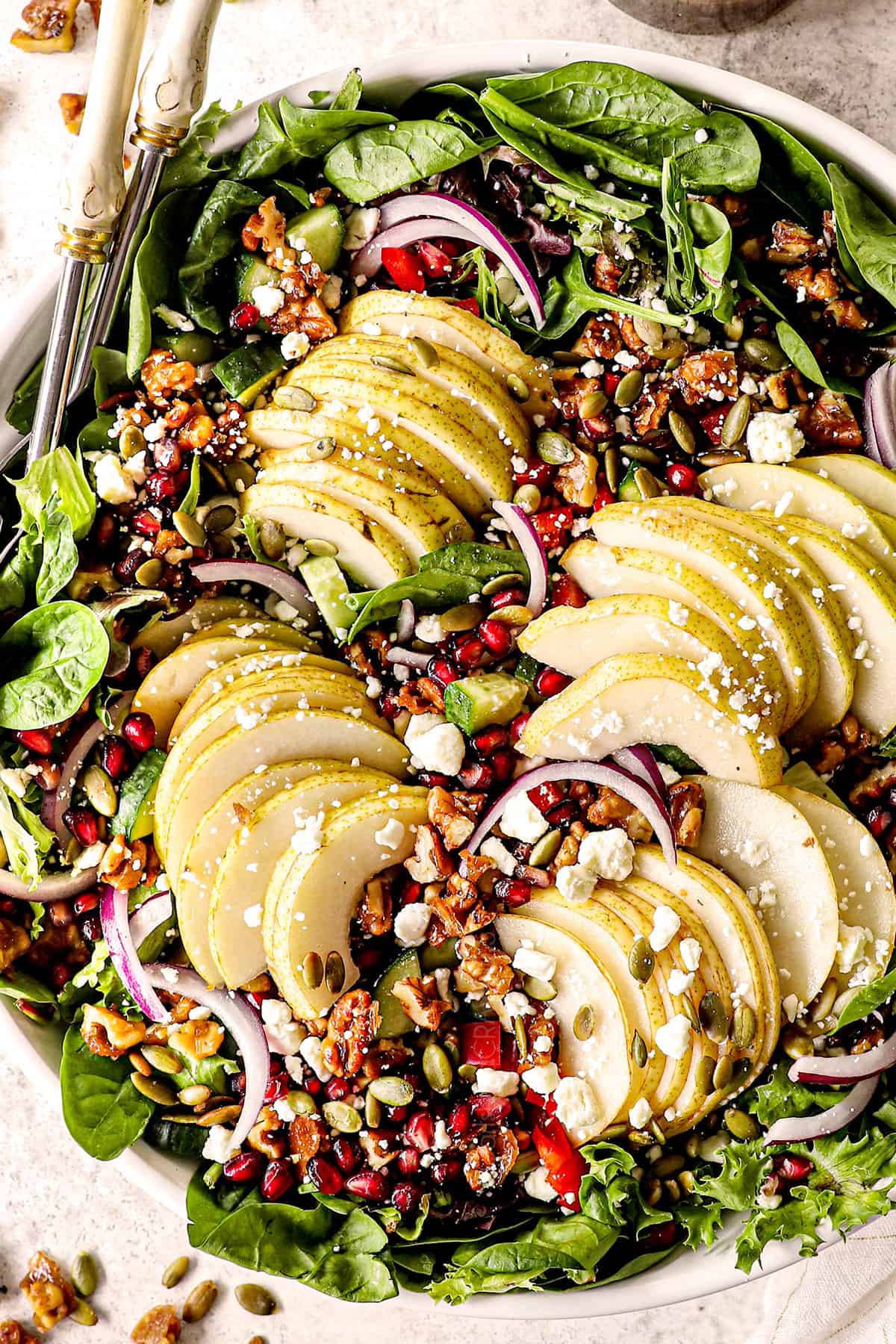 top view of pear salad with gorgonzola, pears, pomegranates, walnuts