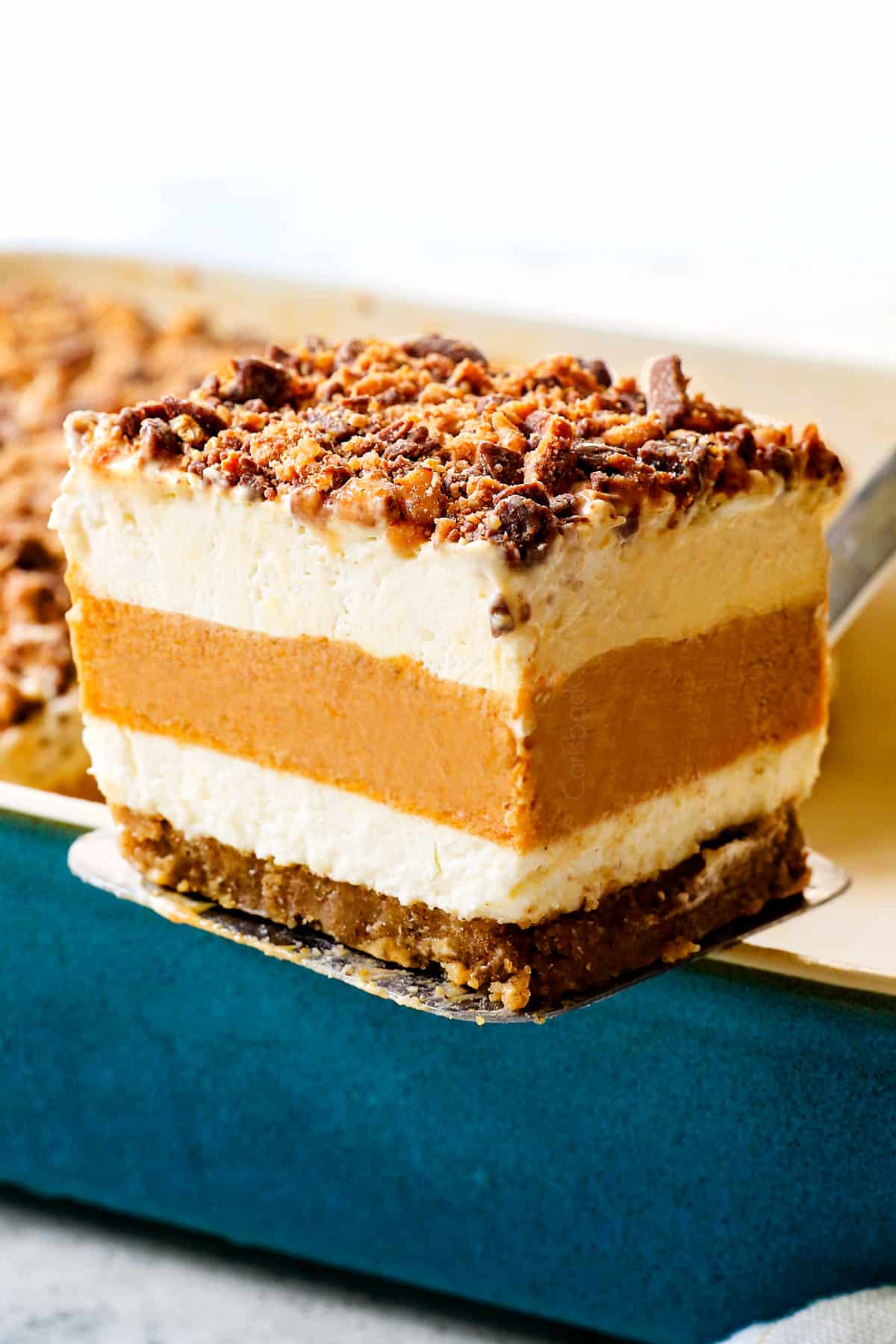 serving pumpkin delight (pumpkin lush) topped with toffee bits