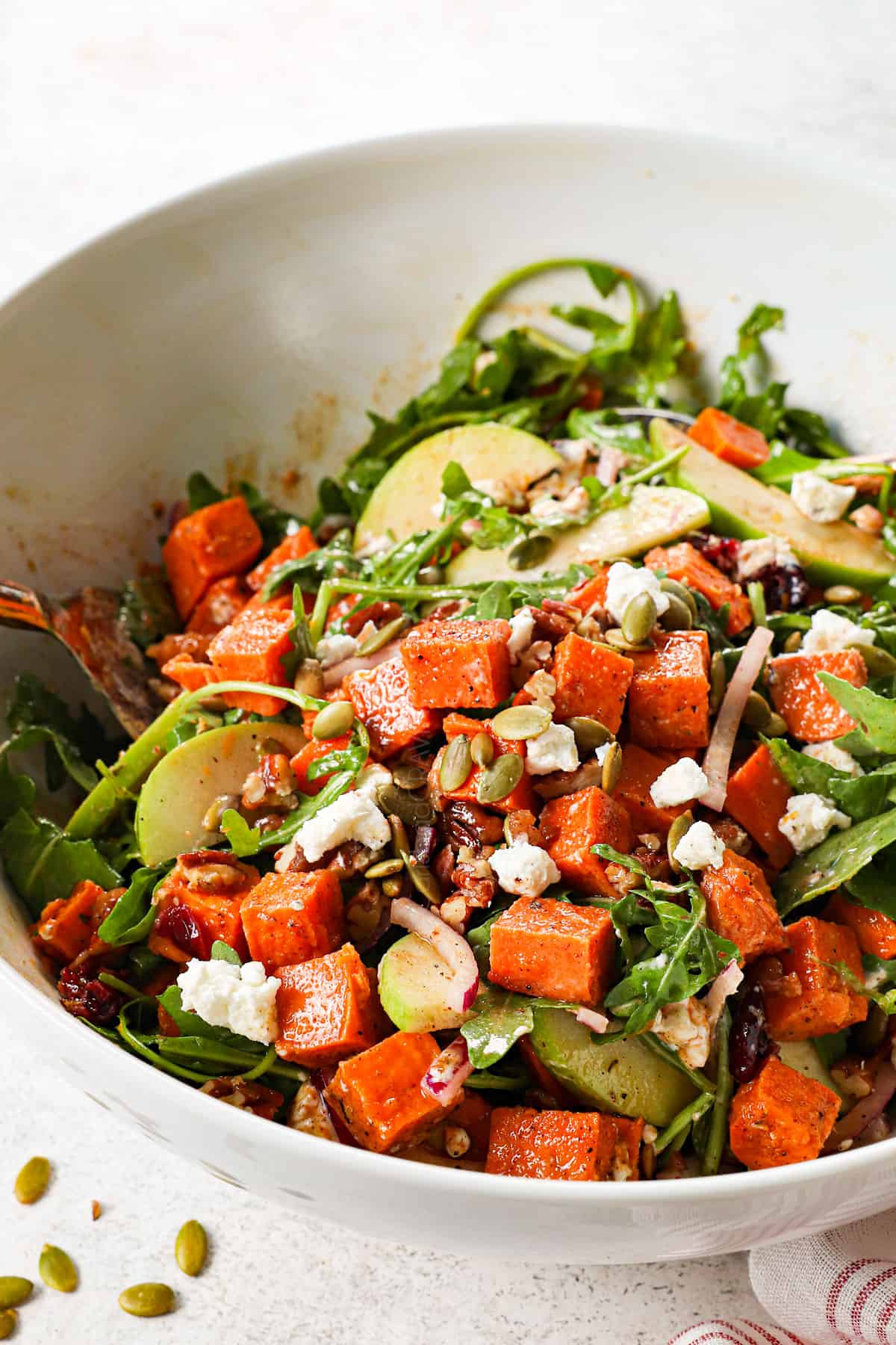 sweet potato salad recipe in a bowl with roasted sweet potatoes