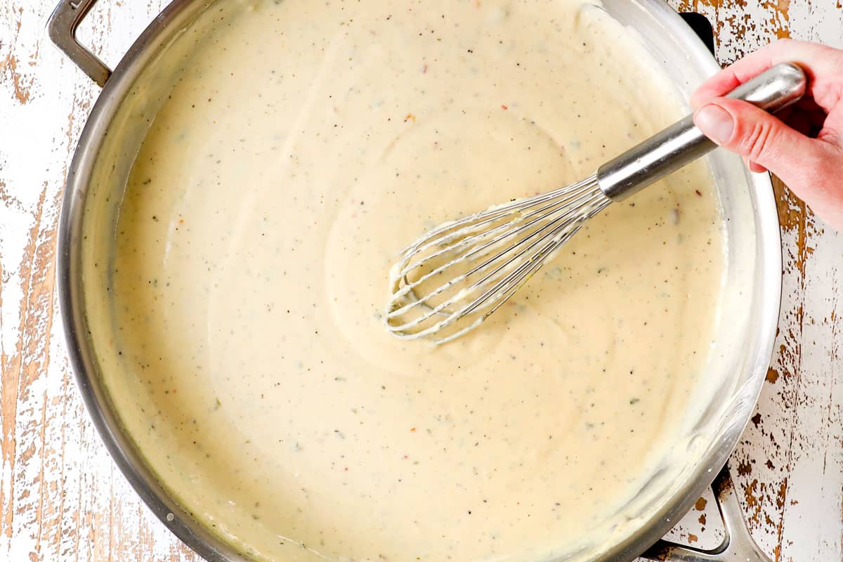 showing how to make old fashioned baked macaroni by simmering the béchamel sauce until thick