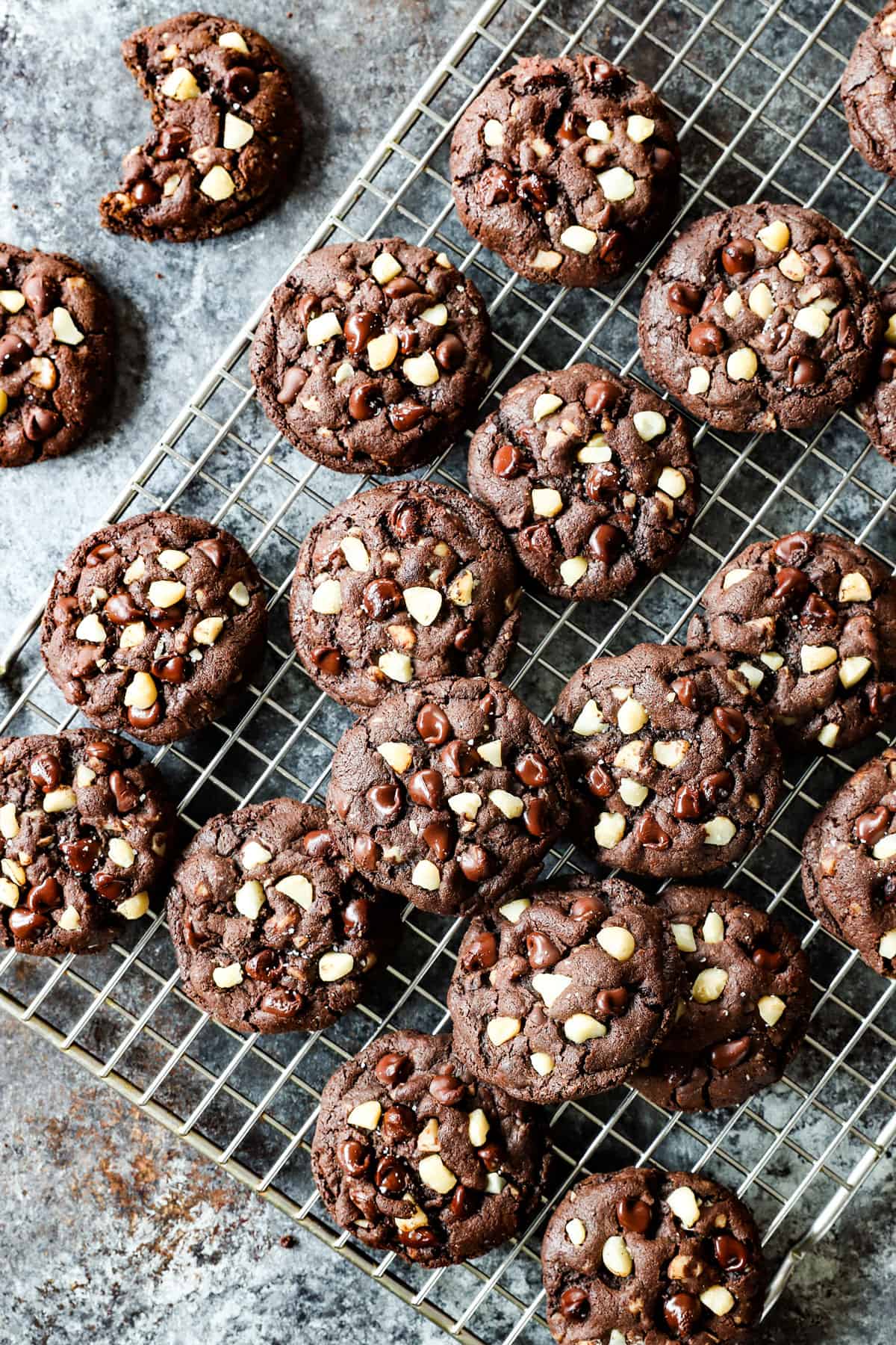 top view showing how to make macadamia nut cookies by cooling on a wire rack
