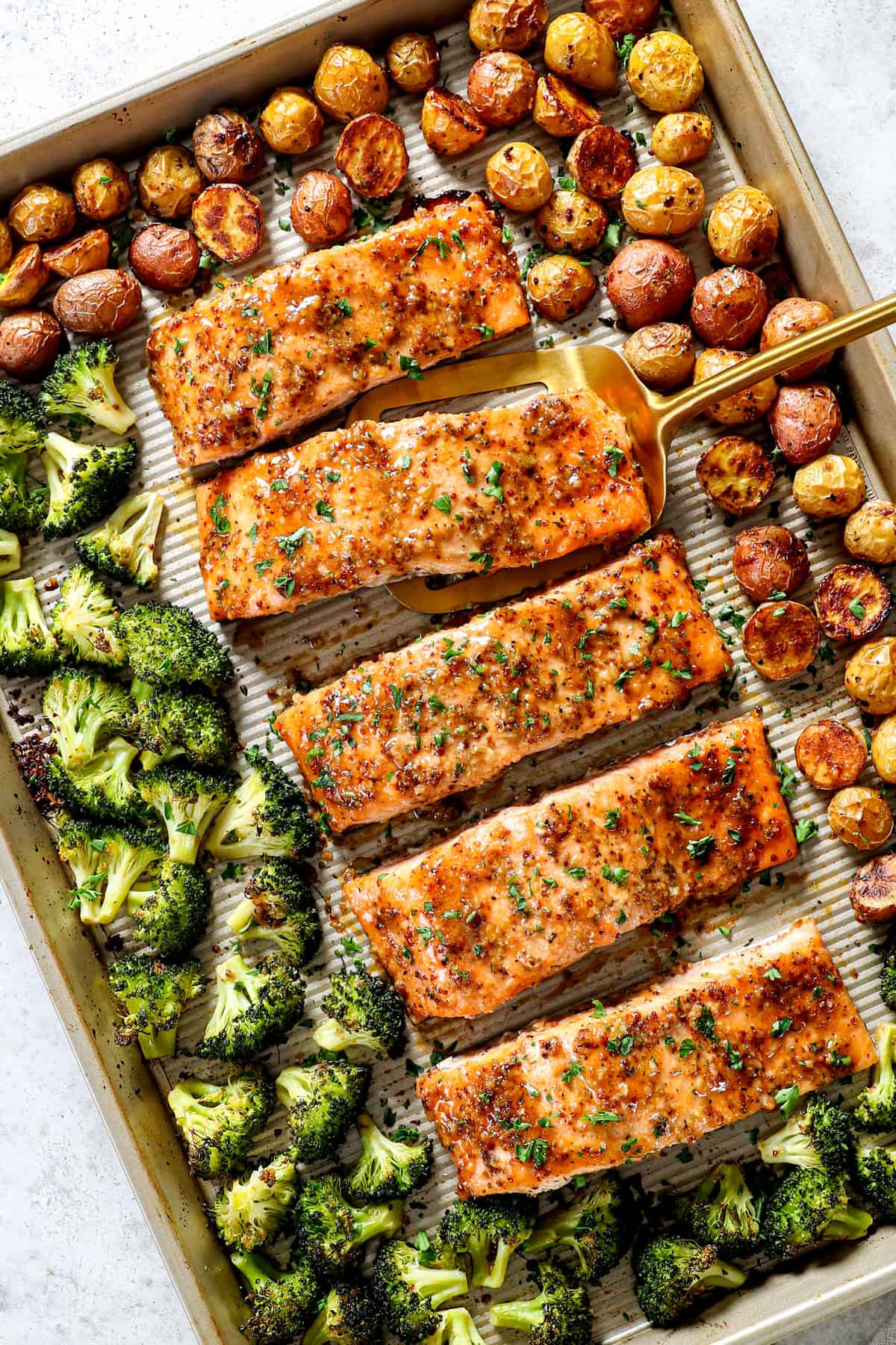 top view of showing how to make easy honey mustards salmon by baking until the salmon is flaky