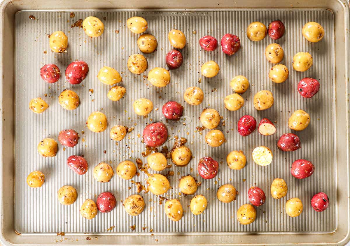 showing how to make easy honey mustard salmon recipe by roasting vegetables