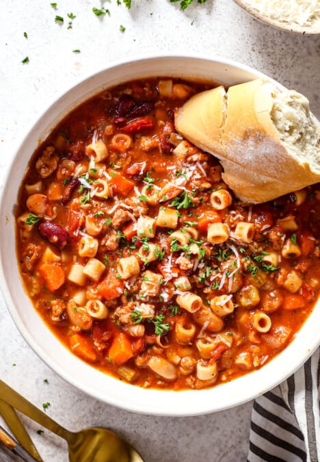 top view of pasta fagioli (pasta fazool) garnished with fresh parsley