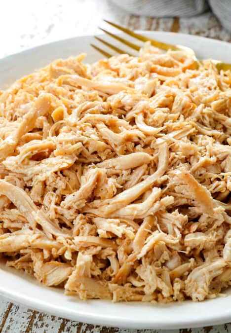 up close of shredded chicken recipe showing how tender and juicy it is