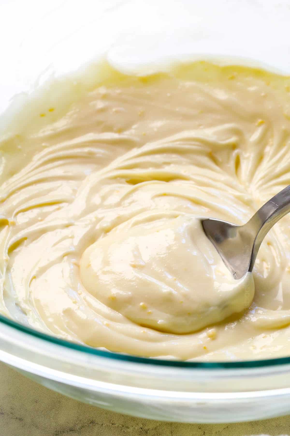 showing how to serve crepe recipe by making sweetened cream cheese