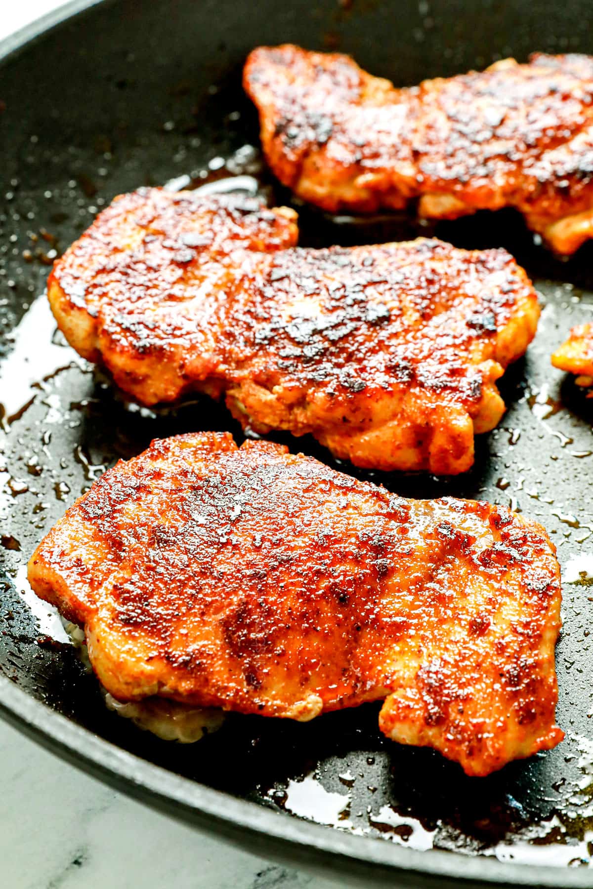 showing how to make chicken quesadillas by cooking the chicken in a skillet until golden and cooked to 165 degrees F