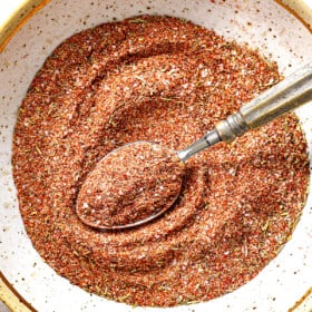 top view of mixing steak seasoning recipe together in a bowl