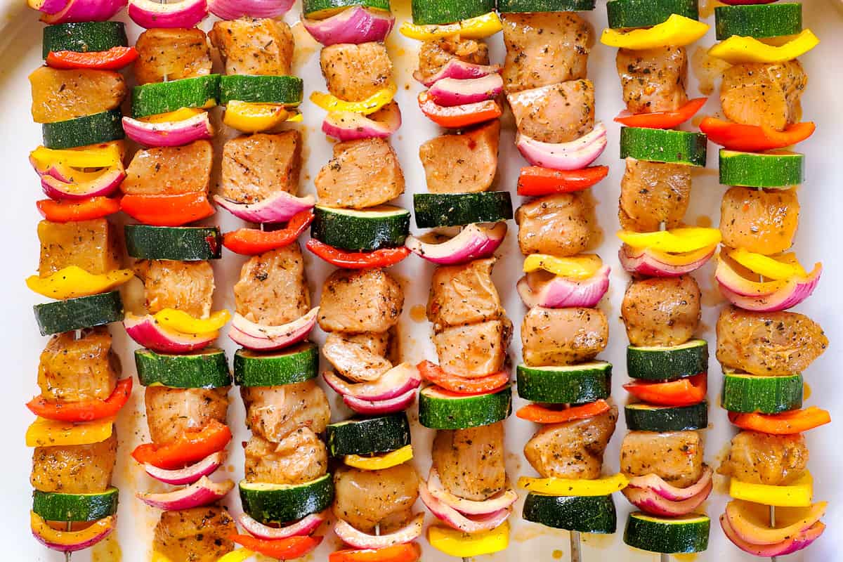 a collage showing how to make oven chicken kabobs (chicken kebabs) by threading chicken and vegetables onto skewers