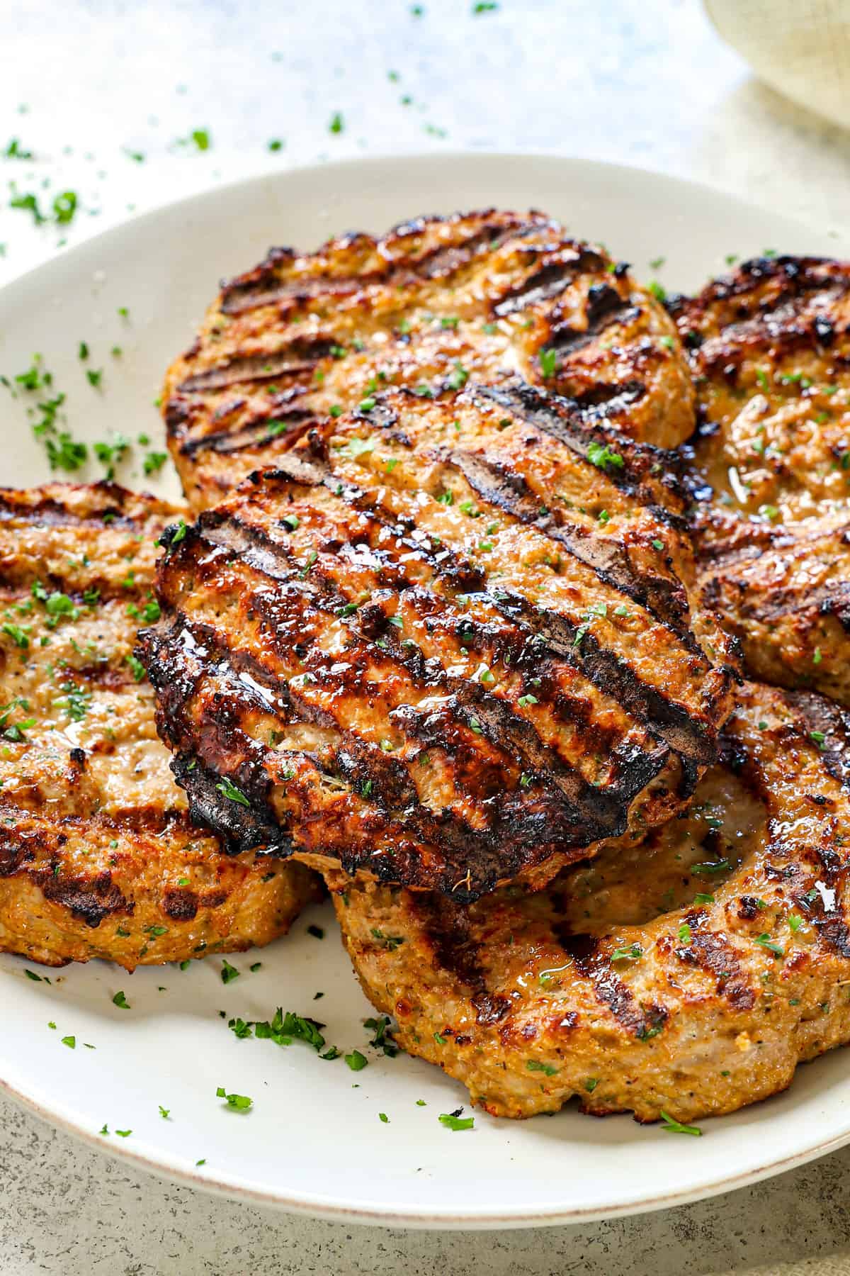 showing how to make turkeyburgers by grilling