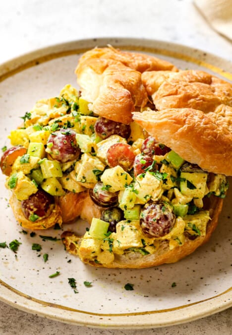 showing how to serve curry chicken salad as a sandwich