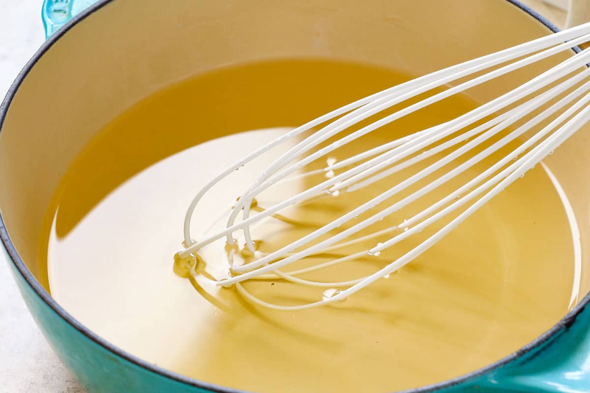 showing how to make lemonade by simmering water and sugar together to make a syrup