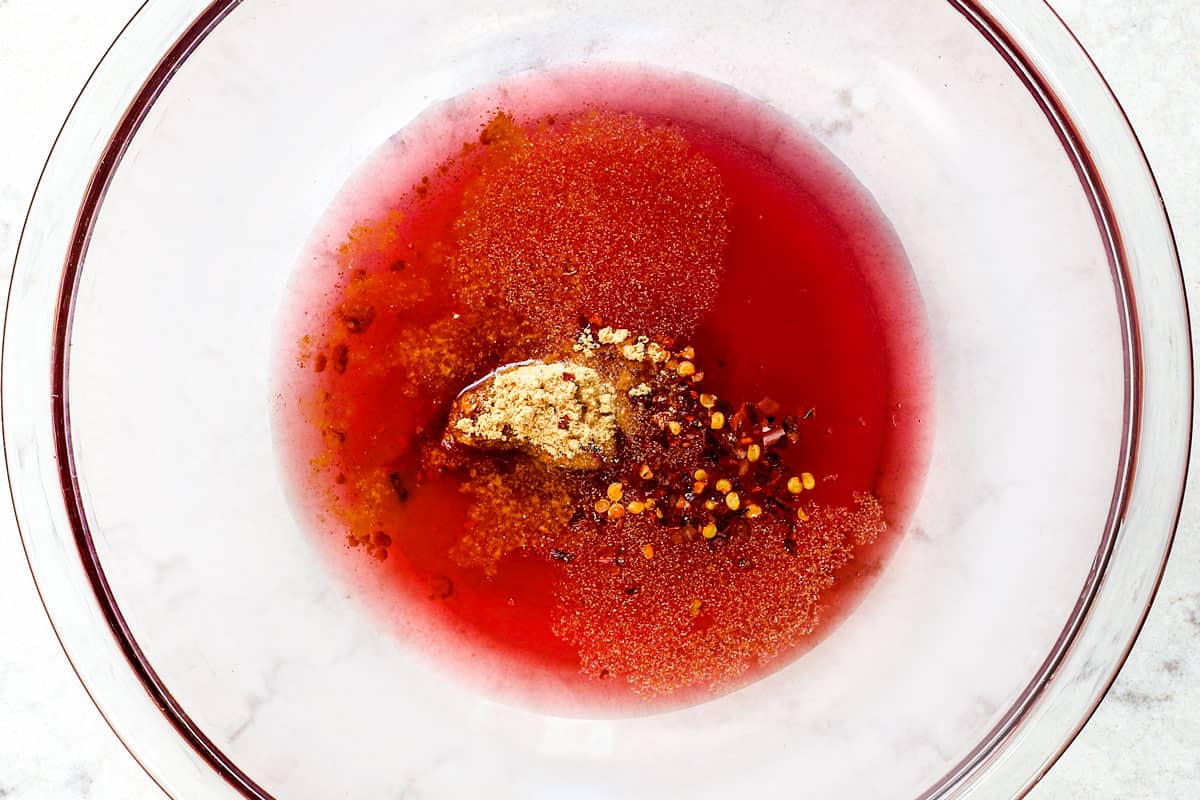 showing how to grill shrimp skewers by making shrimp marinade in a bowl