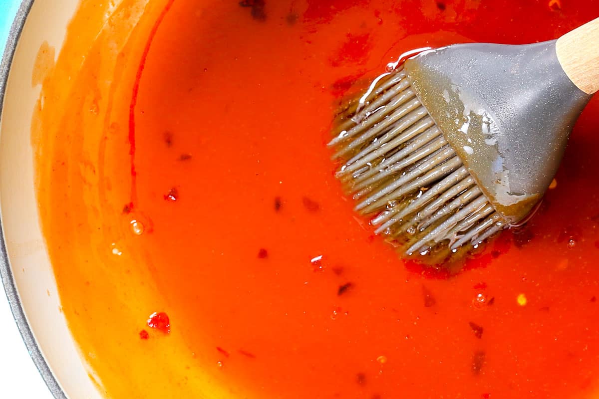 showing how to grill shrimp kabobs by making glaze in a saucepan