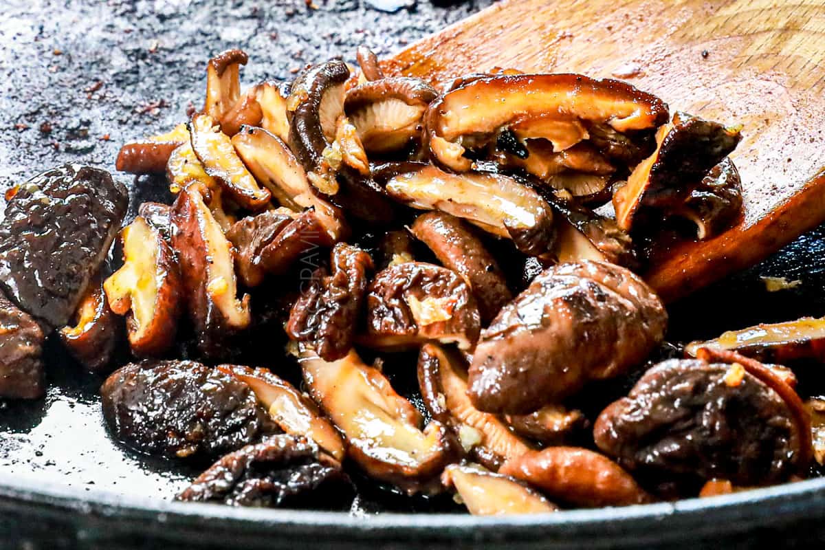 showing how to make bibimbap by sautéing mushrooms