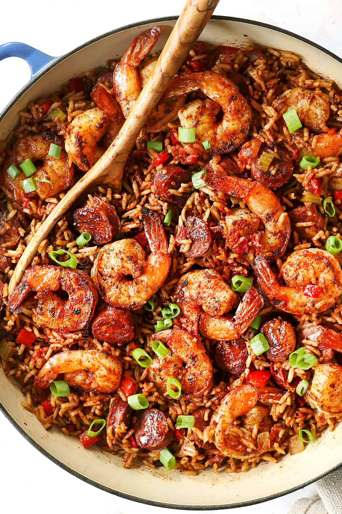 showing how to use Cajun seasoning on shrimp and rice