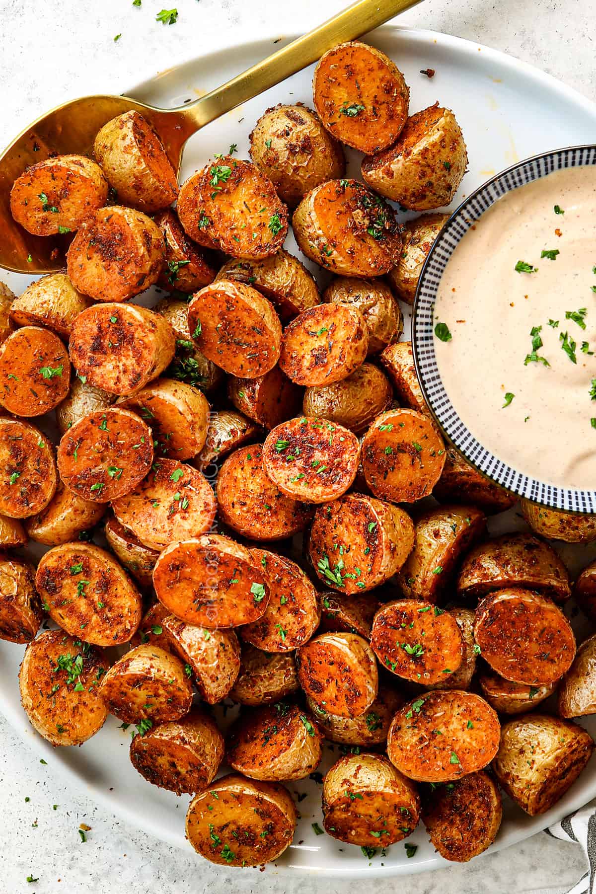 showing how to use Cajun seasoning on roasted potatoes