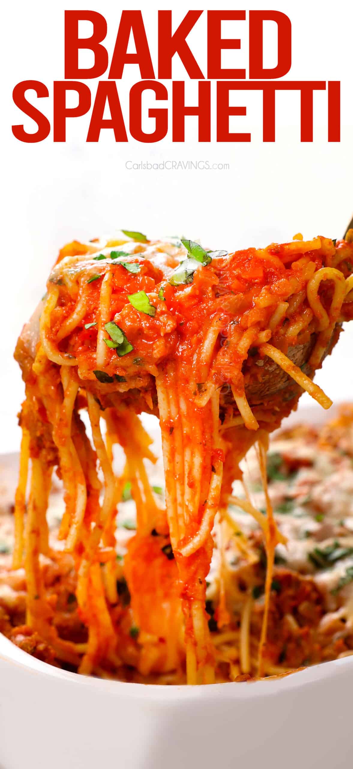A spoonful of serving Baked Spaghetti showing how cheesy it is