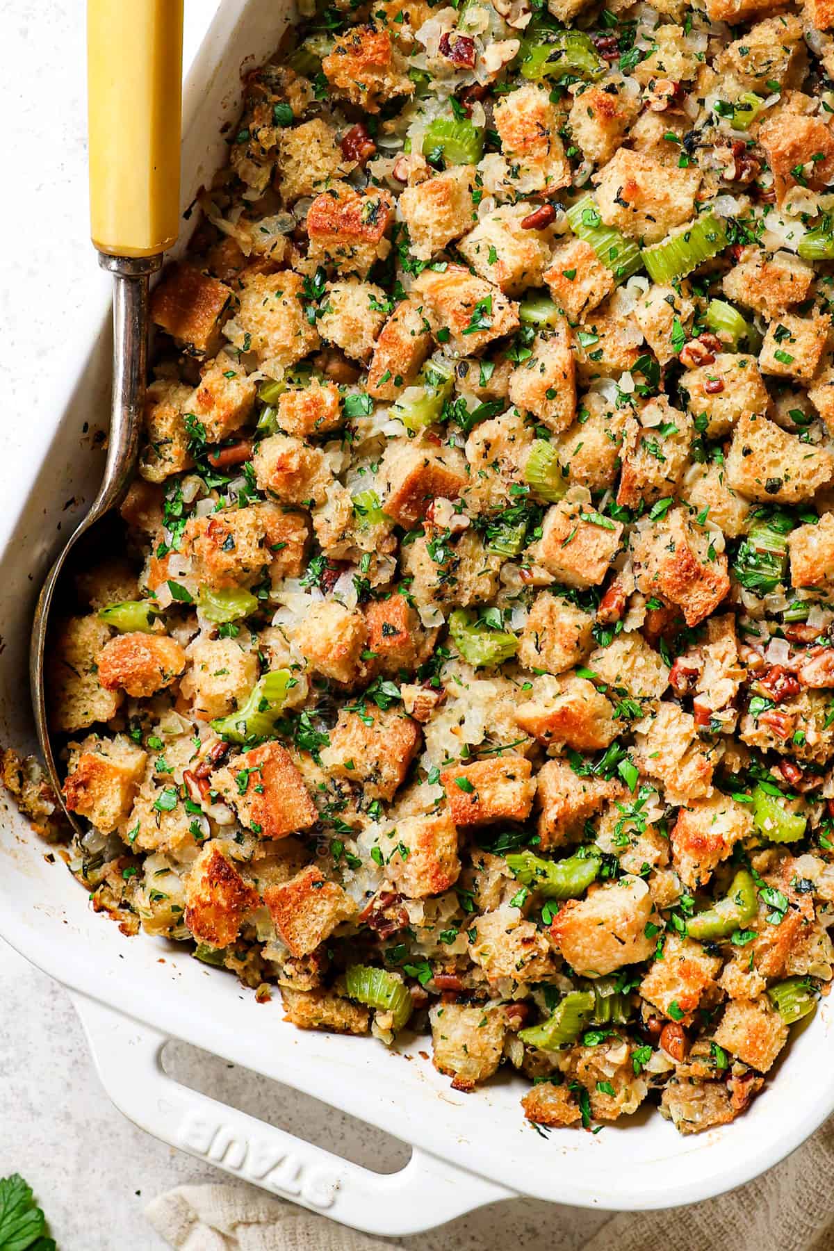 top view of turkey stuffing recipe made with bread, eggs, onions, garlic and herbs