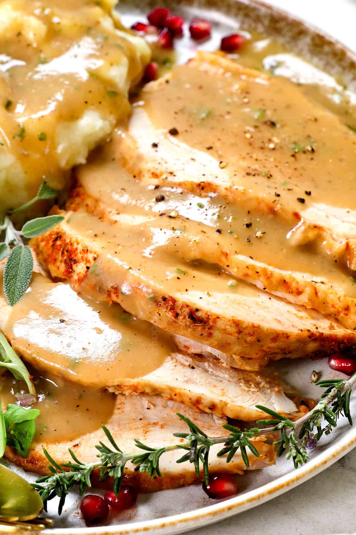 turkey gravy with drippings poured over turkey