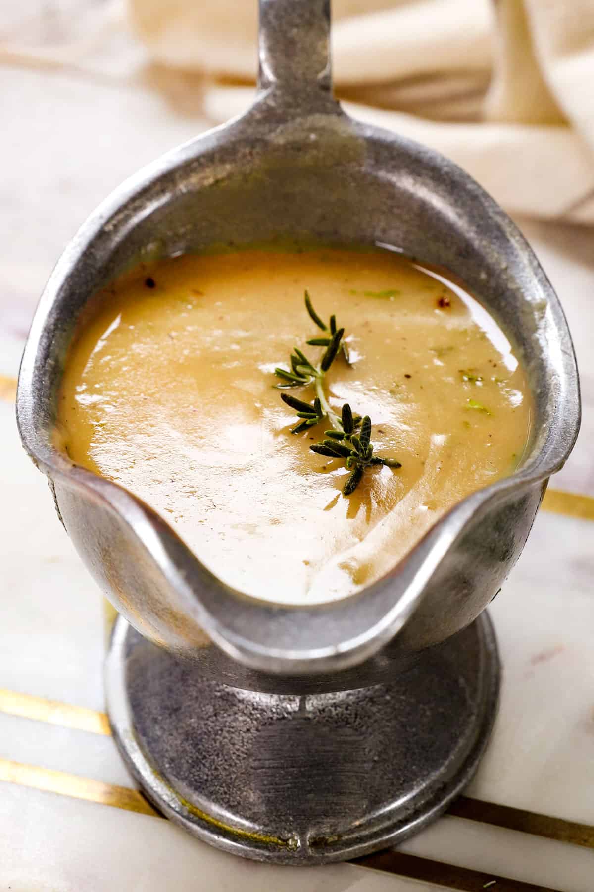 showing how to serve turkey gravy in a gravy boat