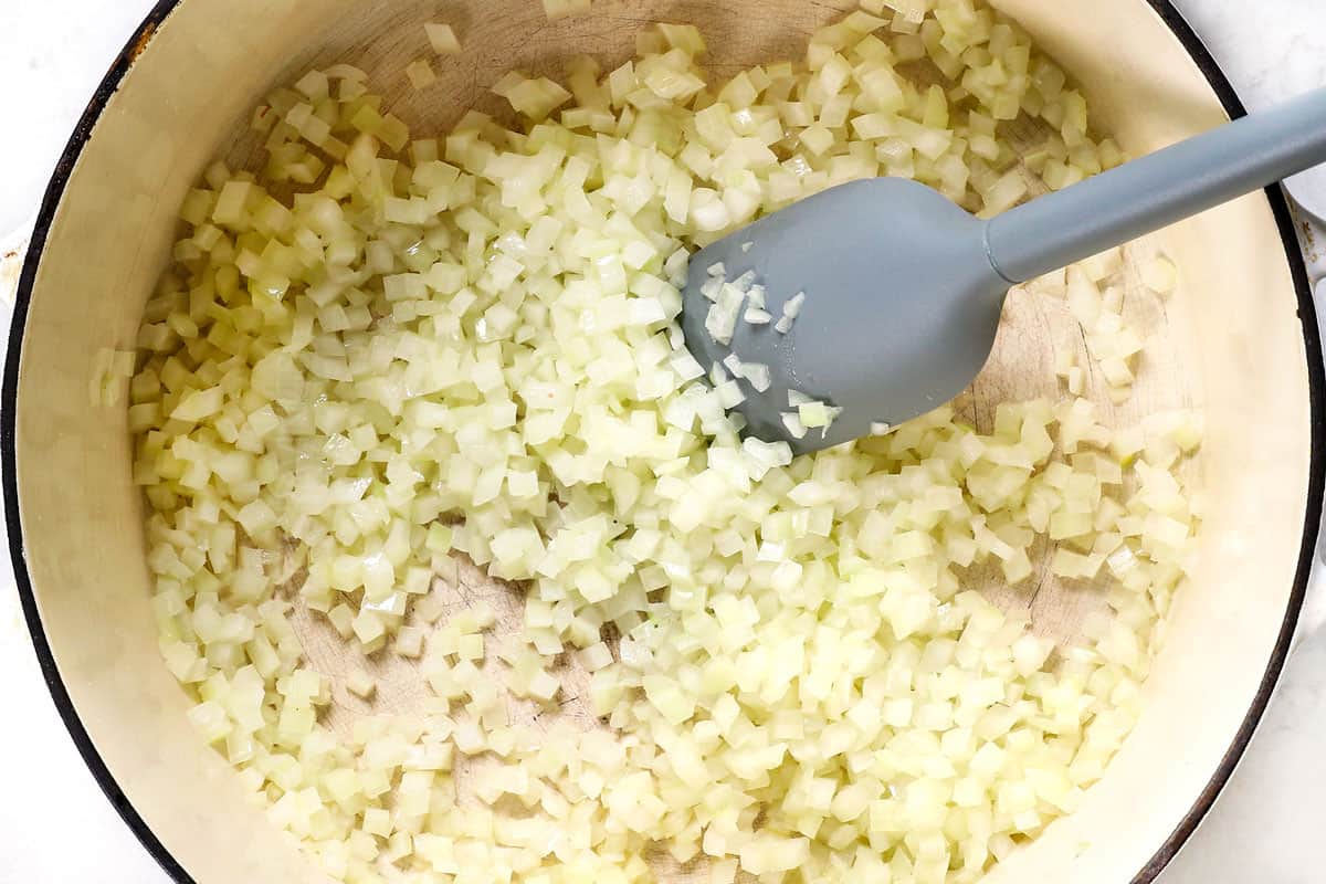 showing how to make Split Pea Soup recipe by sautéing onions until softened