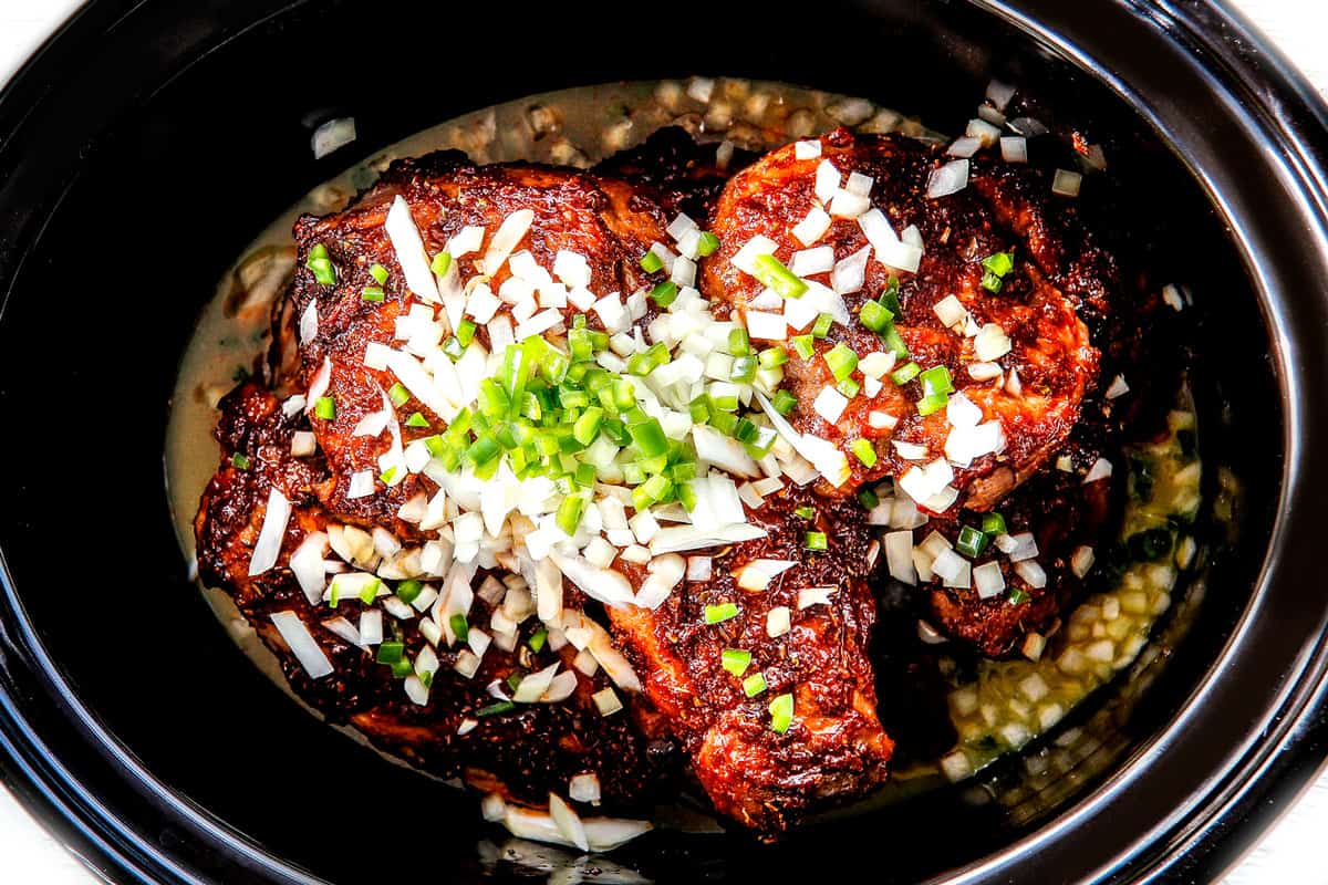 showing how to make carnitas tacos by adding pork, orange juice, lime juice, onion, jalapeno to slow cooker