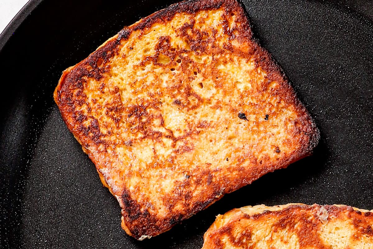 showing how to make French toast by flipping the toast and showing what it should look like when done