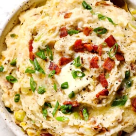 top view of serving colcannon potatoes with a melted butter on top