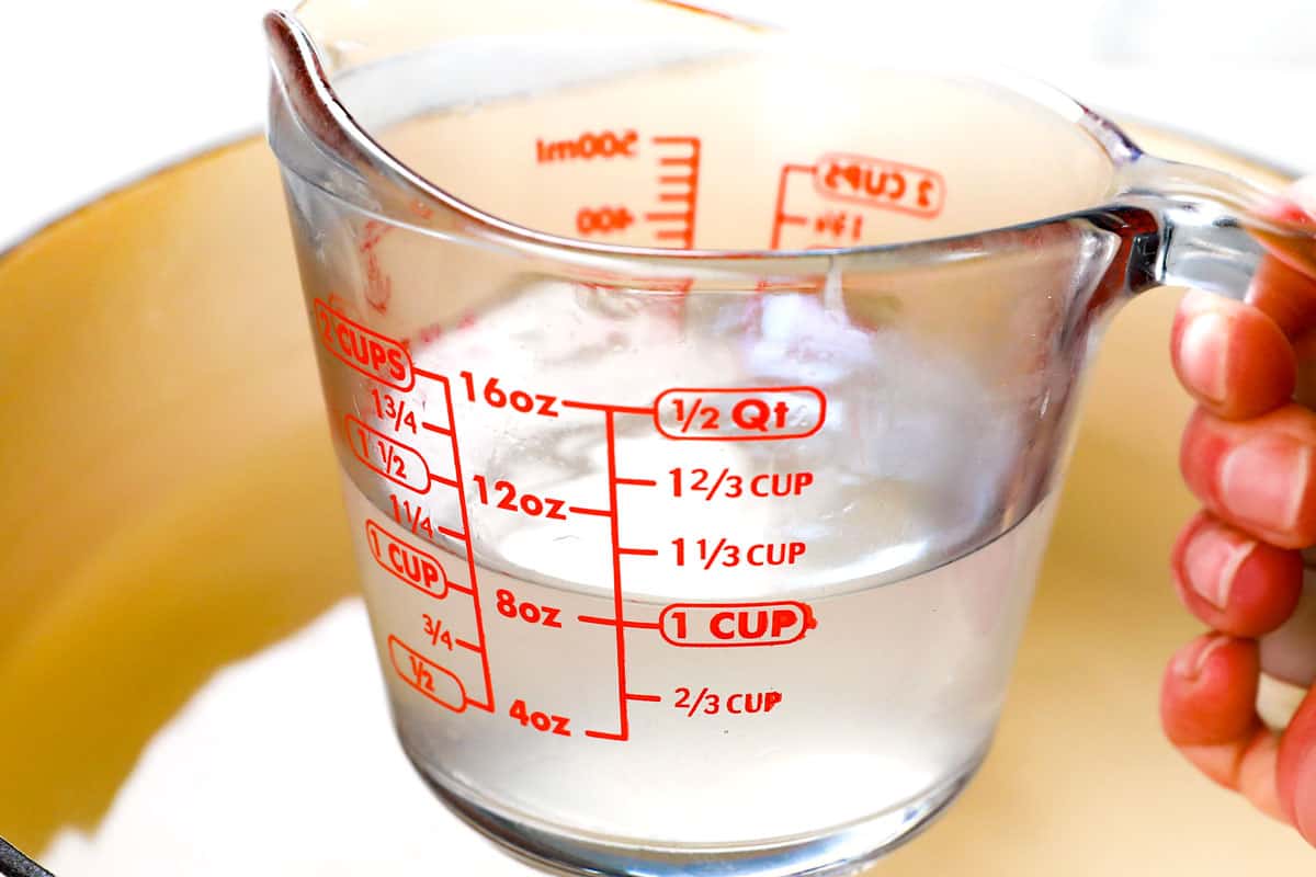 showing how to make homemade pierogi by reserving 1 cup boiling water for the pierogi sauce