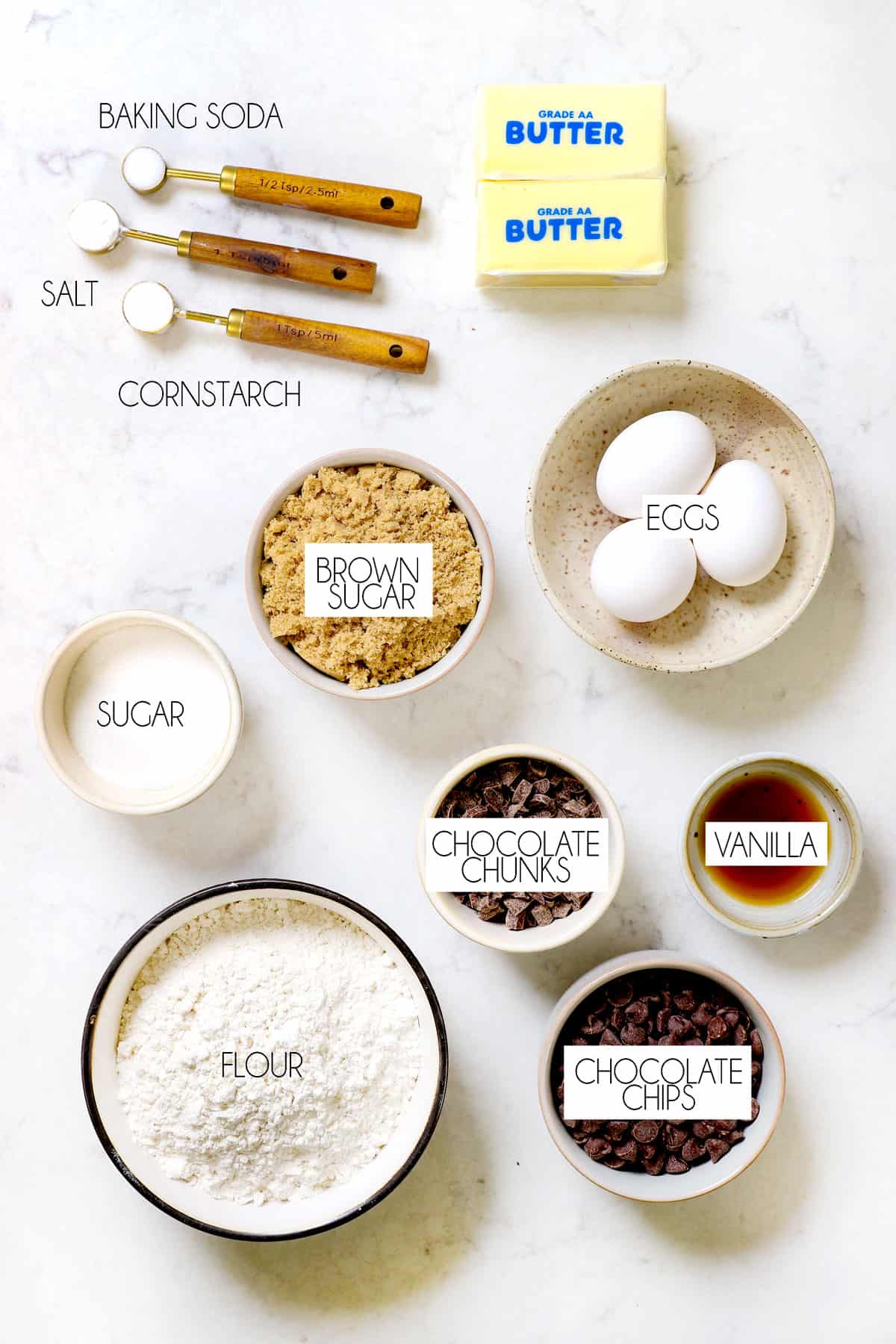 showing pizookie cookie ingredients: flour, sugar, brown sugar, eggs, baking soda, butter, chocolate chips, chocolate chunks