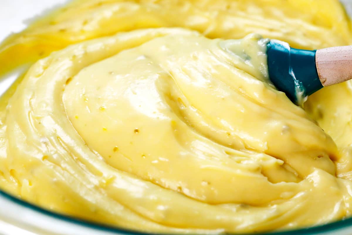 showing how to make Key lime pie recipe by stirring in sour cream