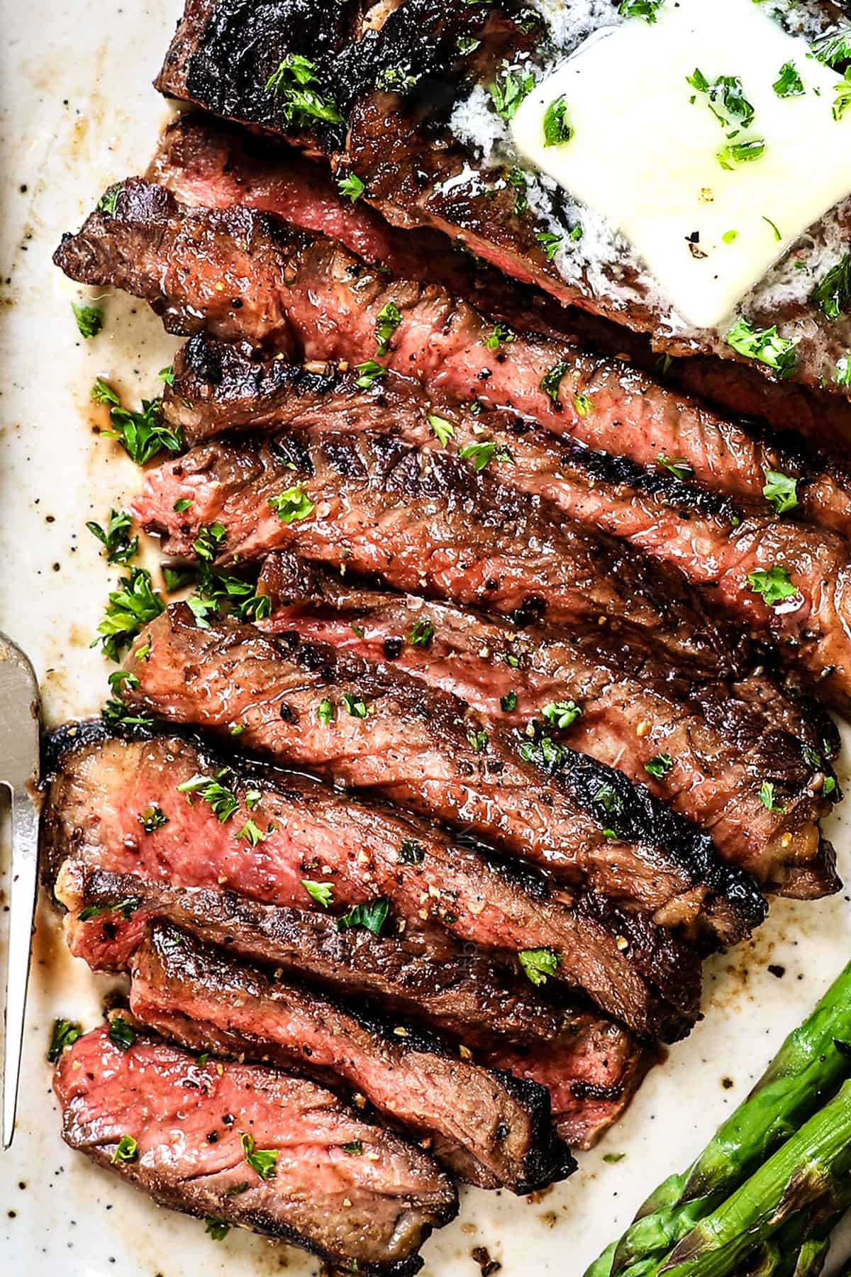 marinade for steak shown with grilled steak