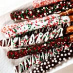top view of chocolate dipped pretzels on a plate showing how to serve
