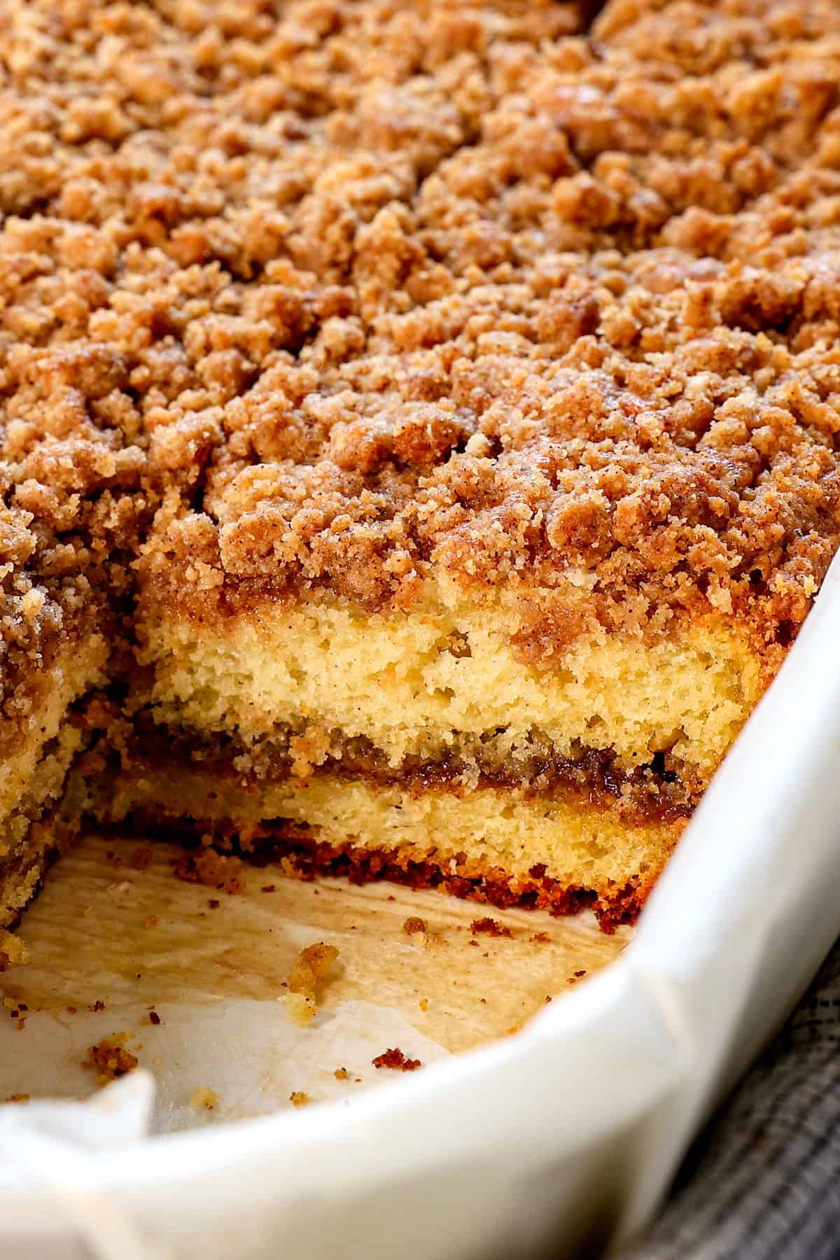 up close of cinnamon coffee cake in the pan showing the cinnamon swirl