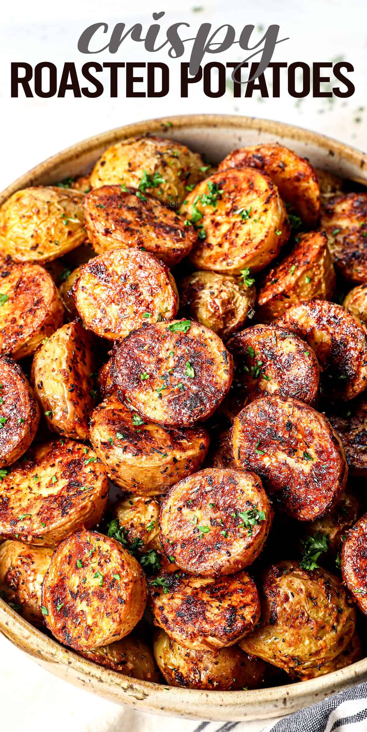 roasted potatoes recipe in a bowl showing how crispy they are