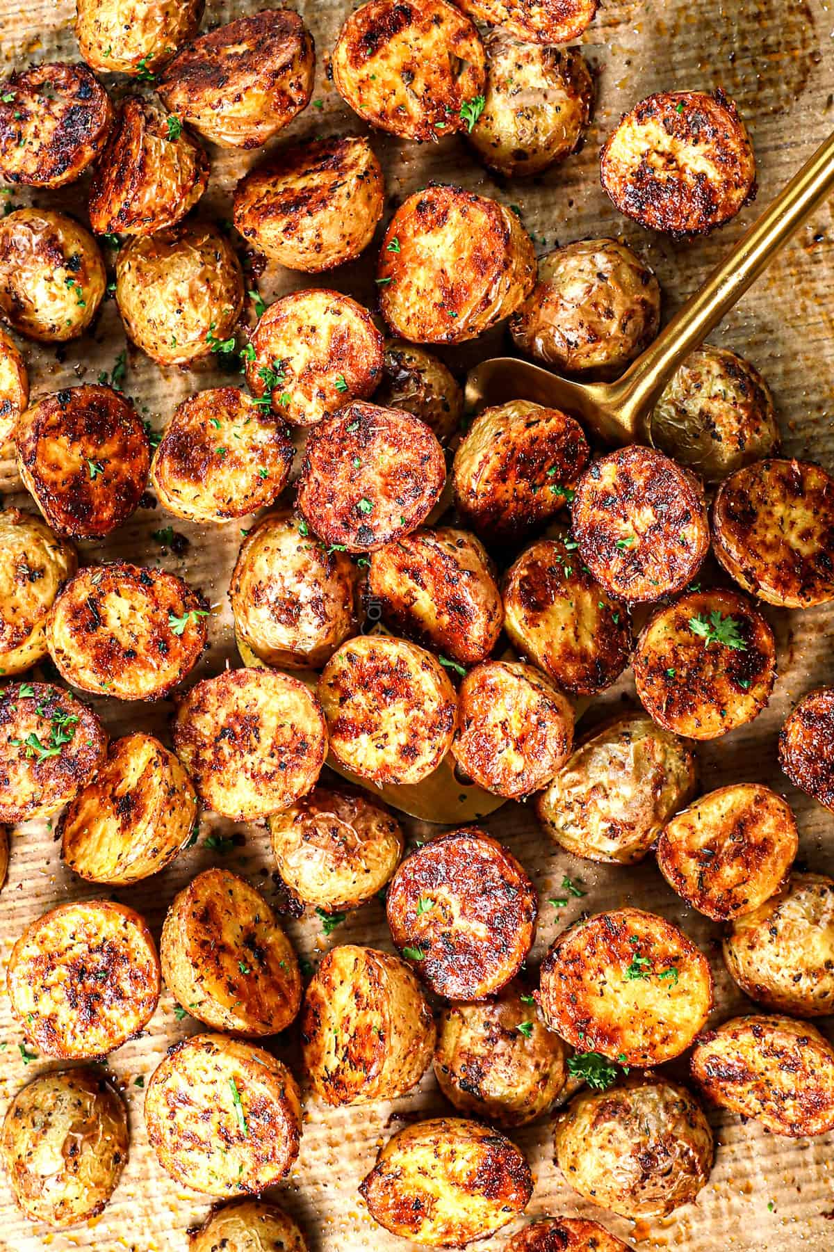 top view of roasted potatoes in oven showing their beautiful caramelization