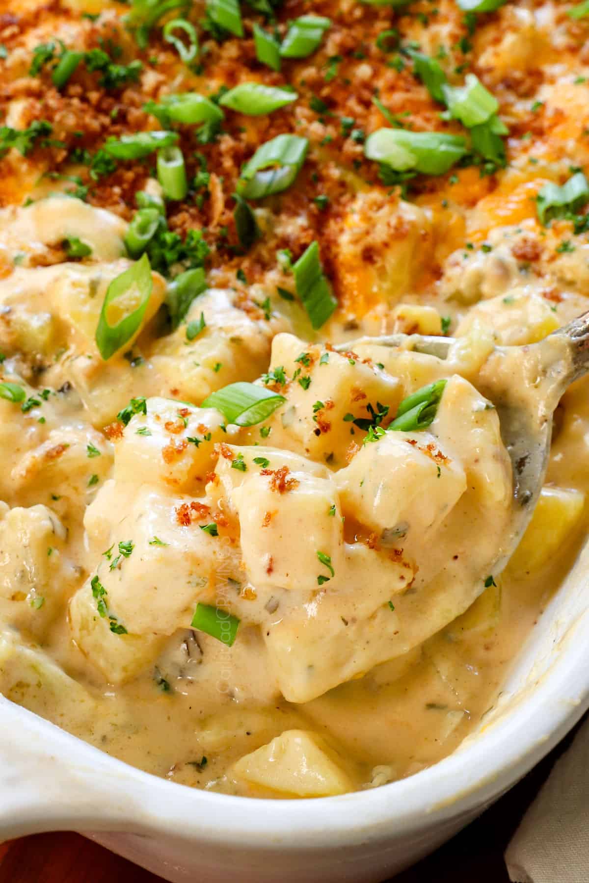 up close of cheesy potatoes recipe showing how cheesy they are