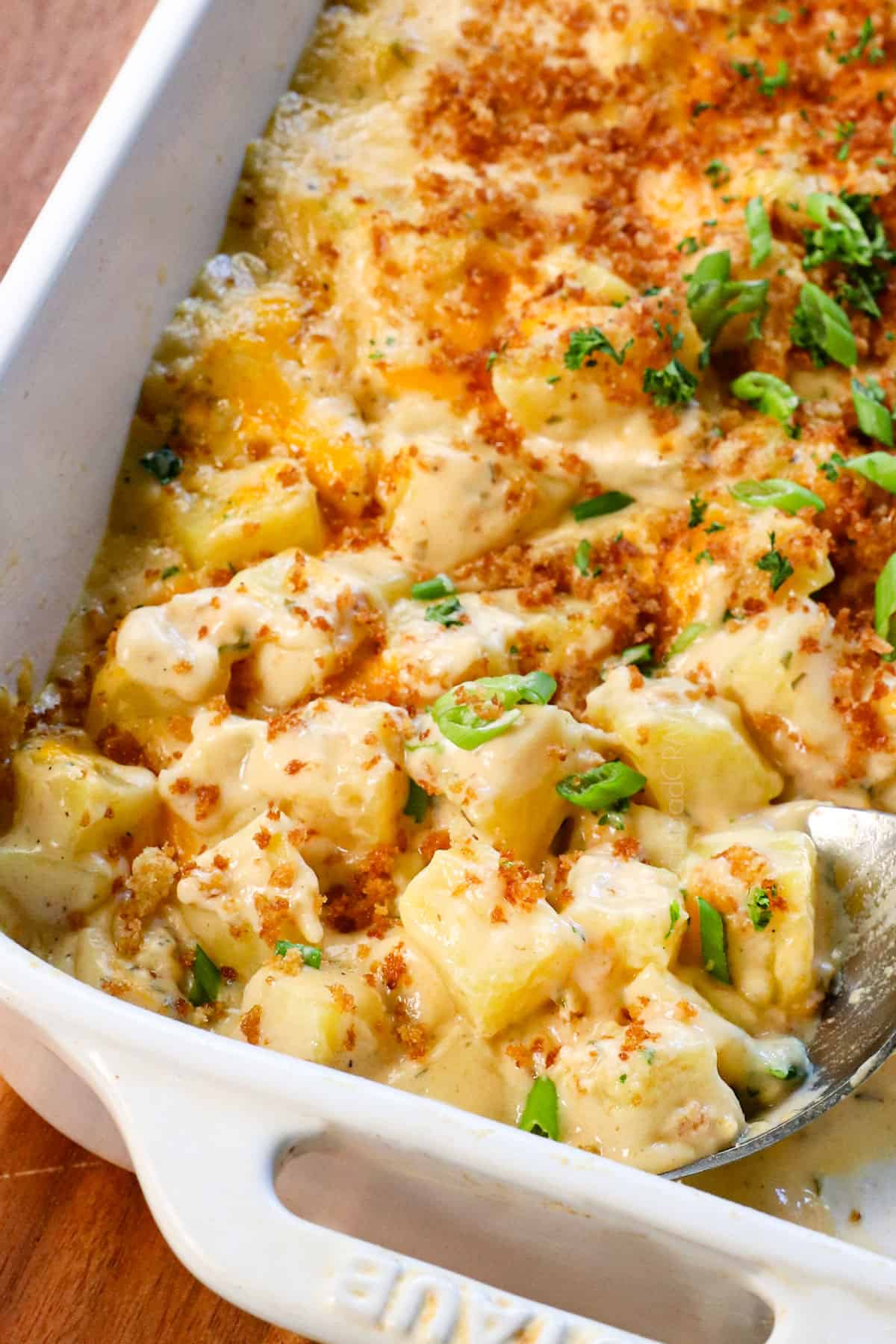 up close of cheesy potatoes recipe showing how cheesy they are