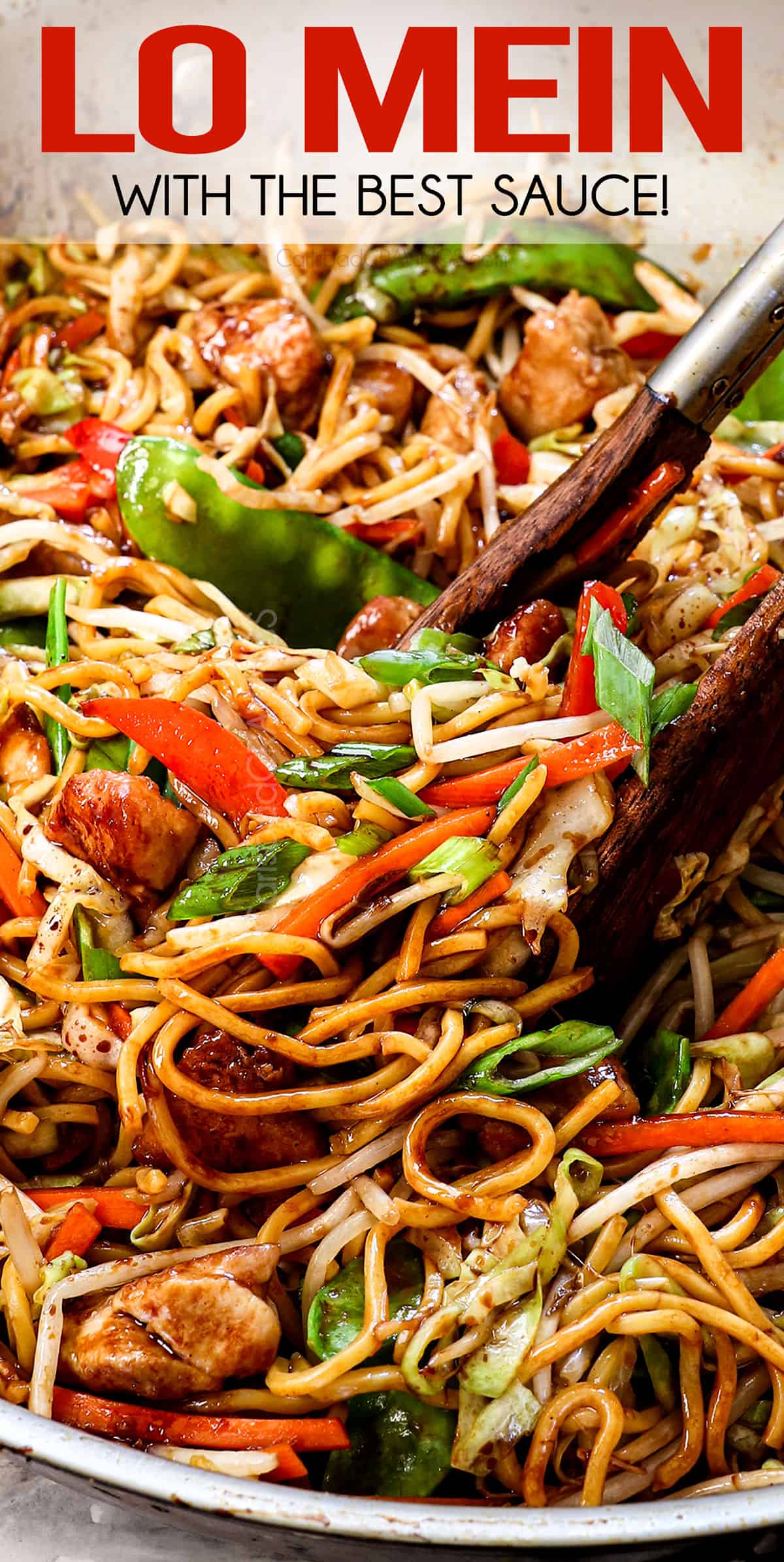 up close of stirring lo mein showing the sauciness