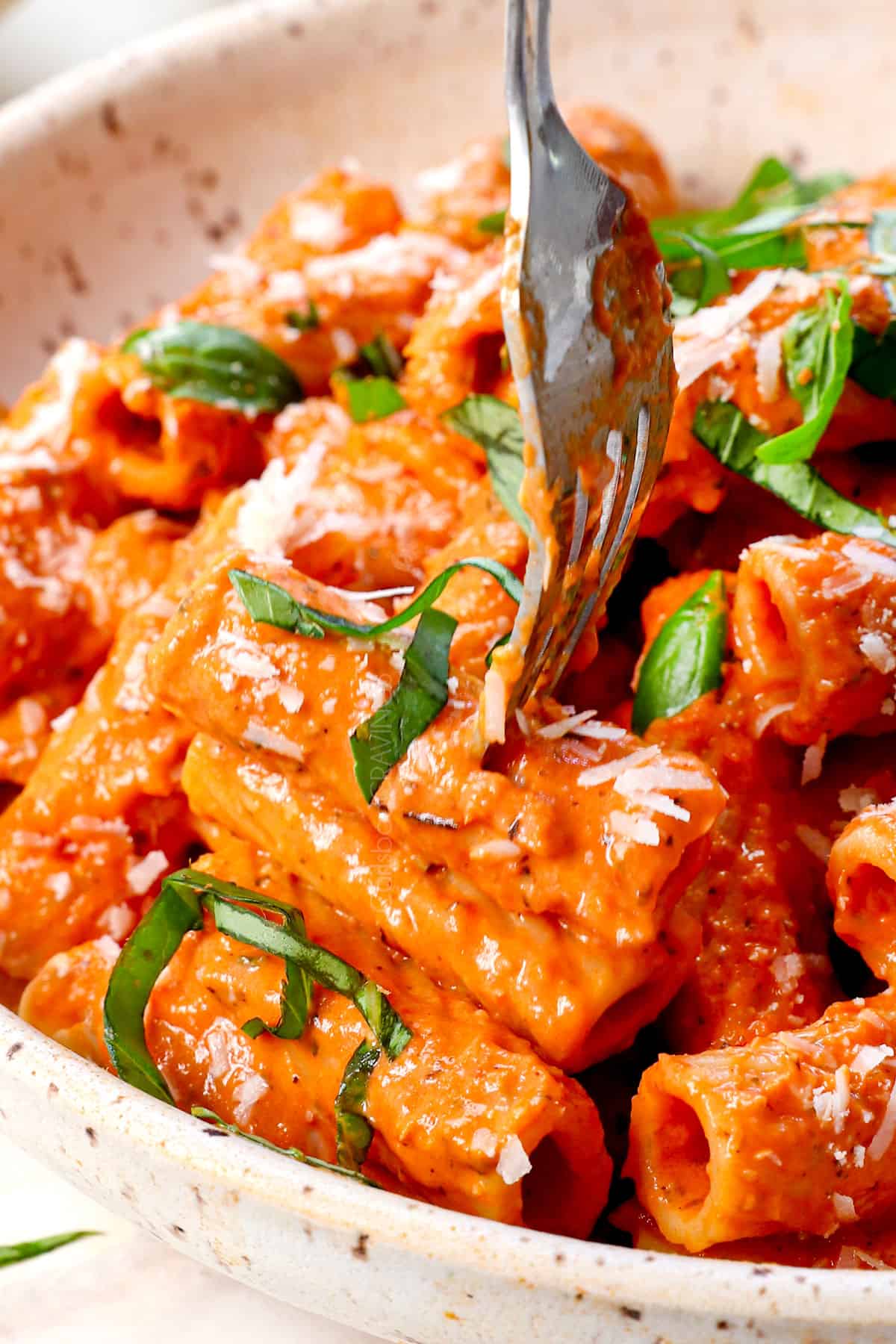 up close of a bite of pink sauce pasta recipe showing the consistency of the sauce