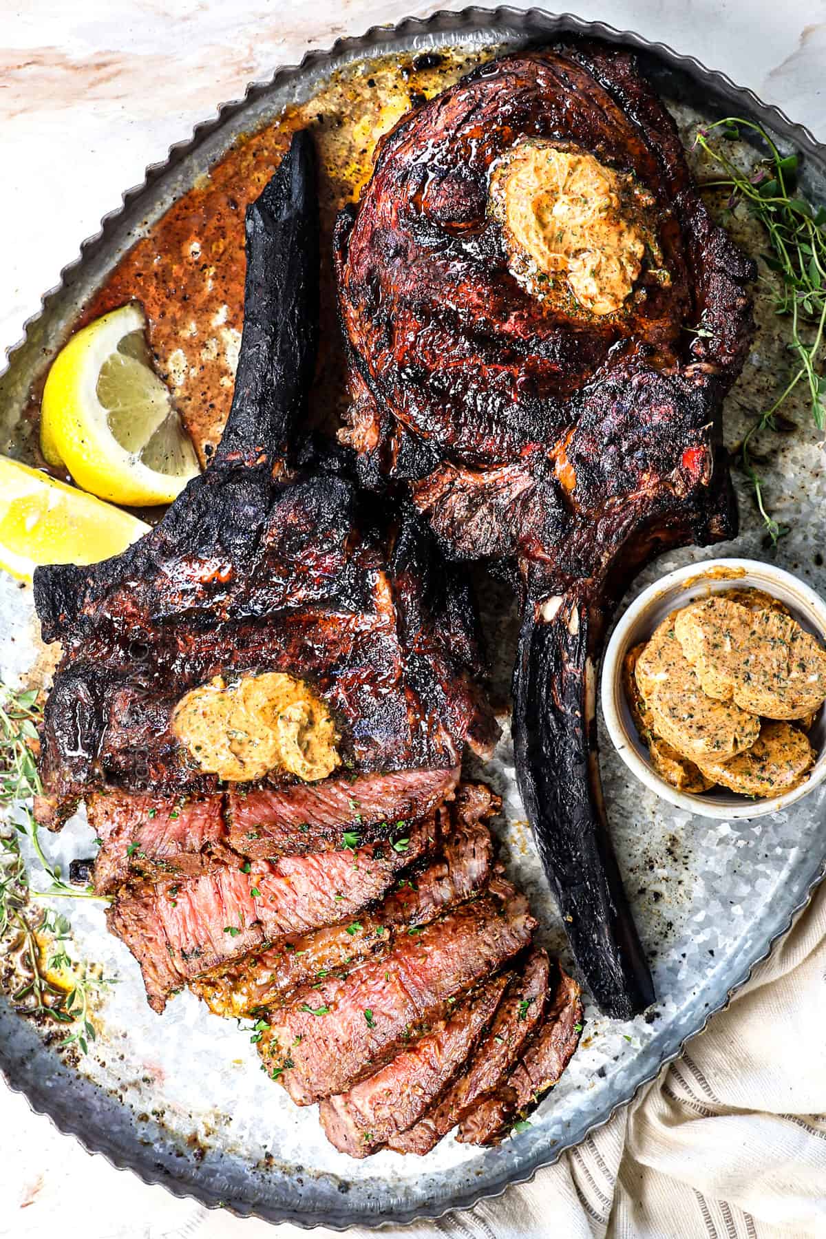 showing how to make tomahawk steak by carving into 1/2-¾ inch slices
