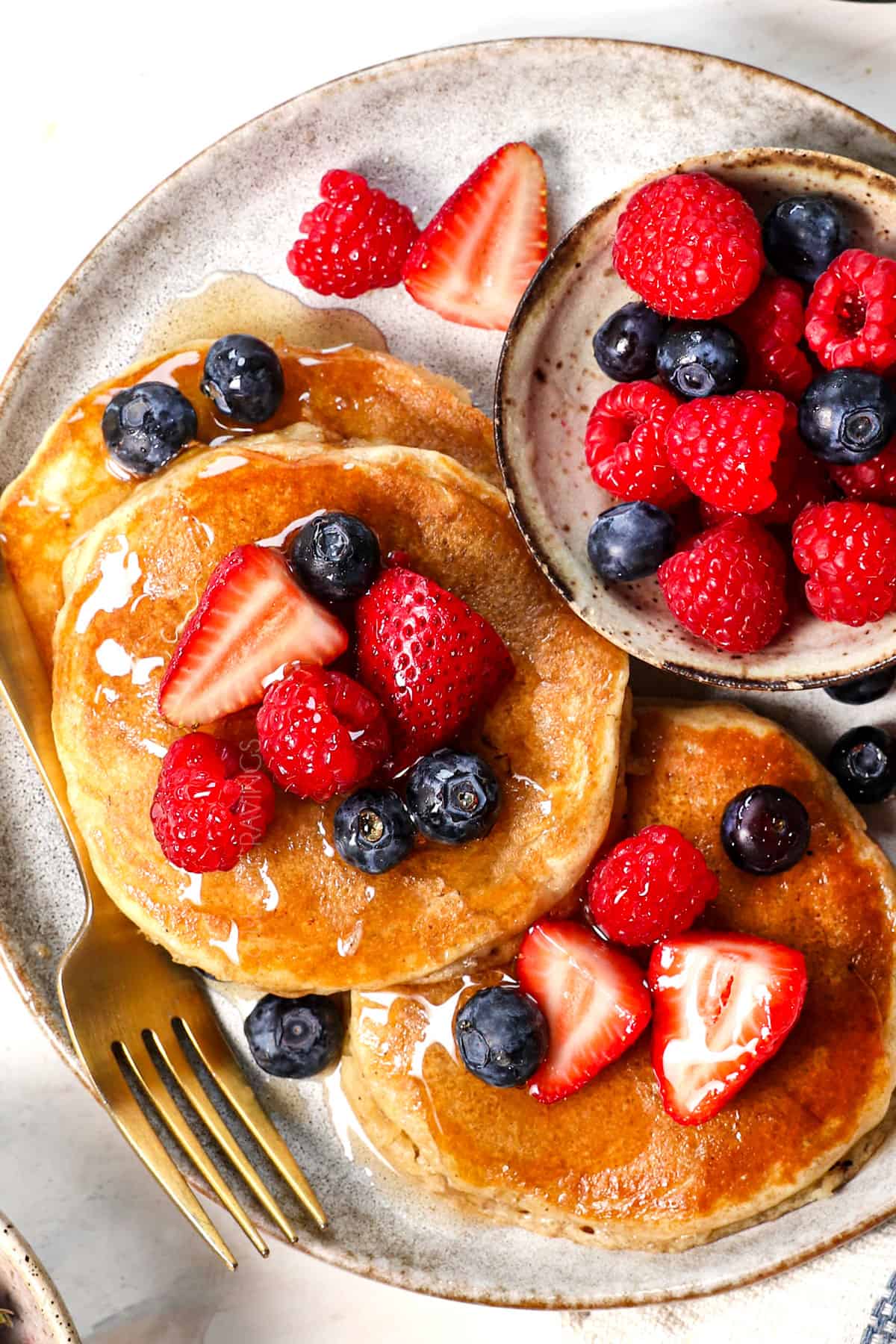 top view best pancake recipe being served on a plate showing the golden tops