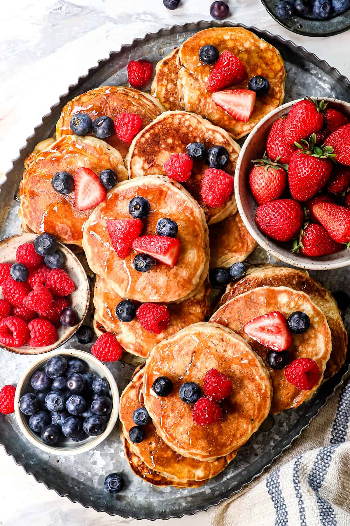 top view of serving pancake recipe on a platter showing the lacy golden tops