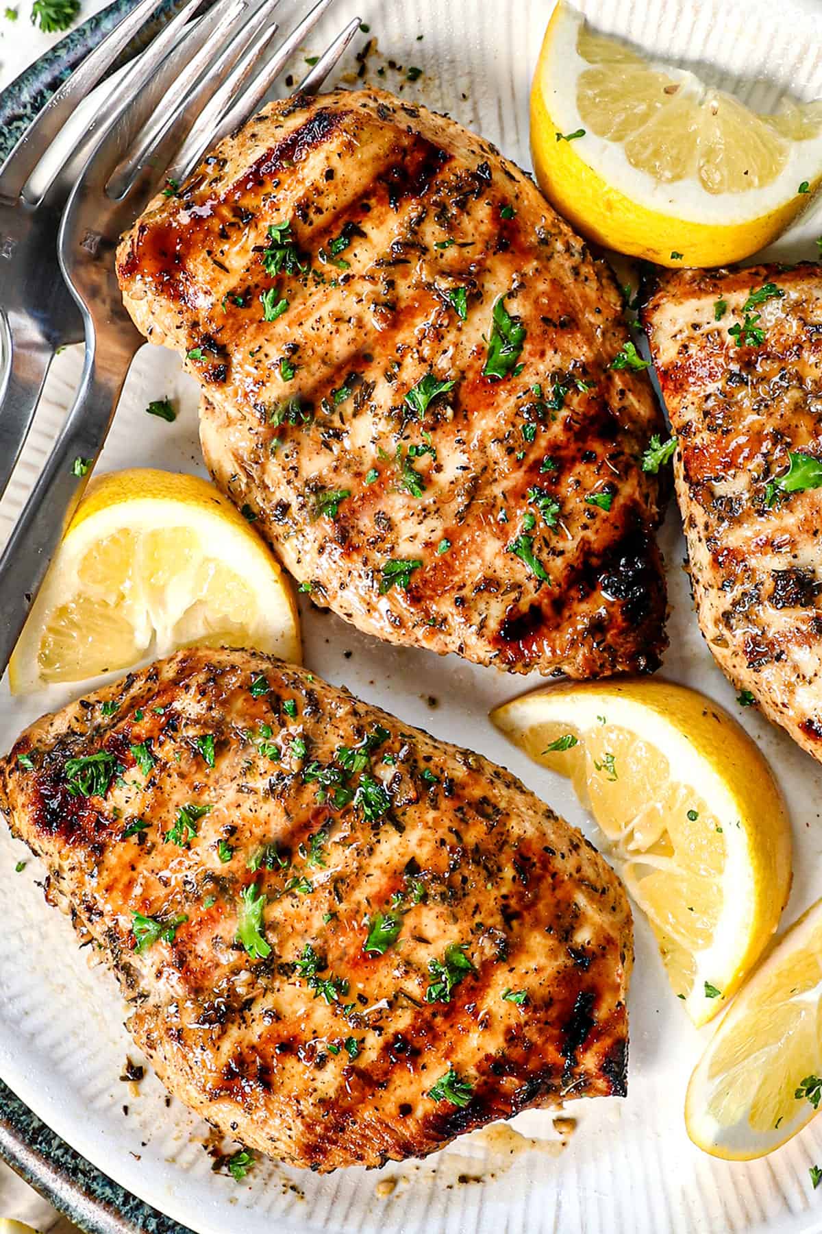 up close of grilling chicken breast showing the beautiful grill marks from cooking over medium-high heat