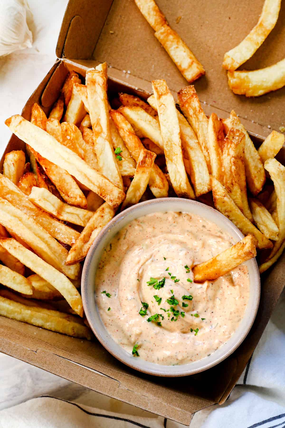top view of garlic aioli recipe being served with French fries
