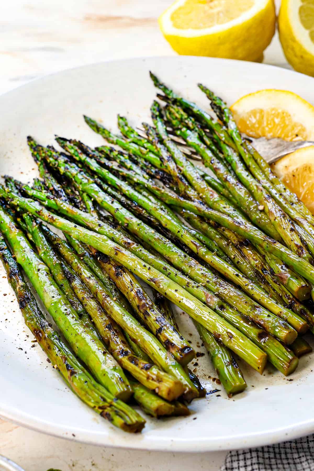 grilled asparagus recipe on a platter showing the grill marks