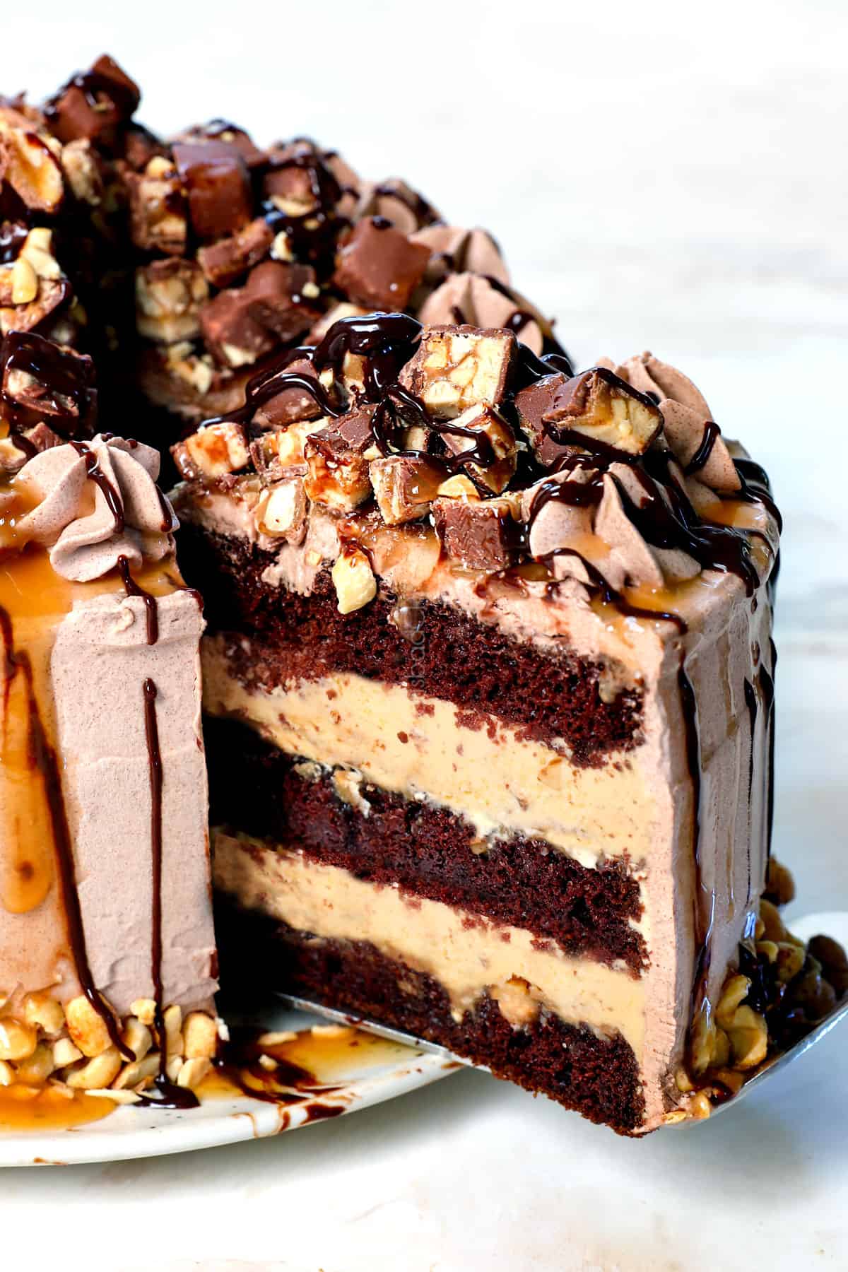 pulling out a slice of homemade ice cream cake from the cake