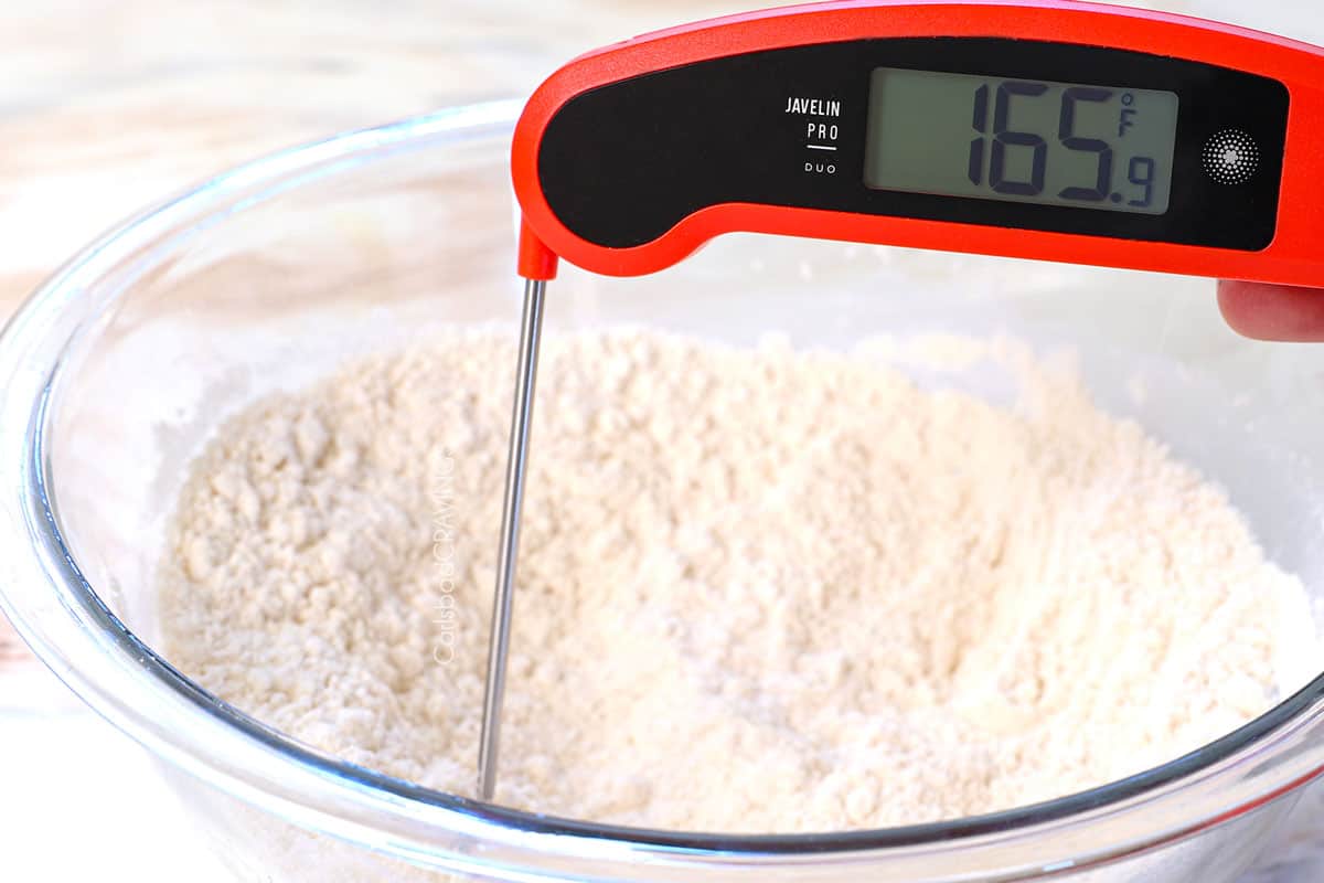 showing how to make edible cookie dough by cooking in the microwave then testing the temperature with an instant thermometer