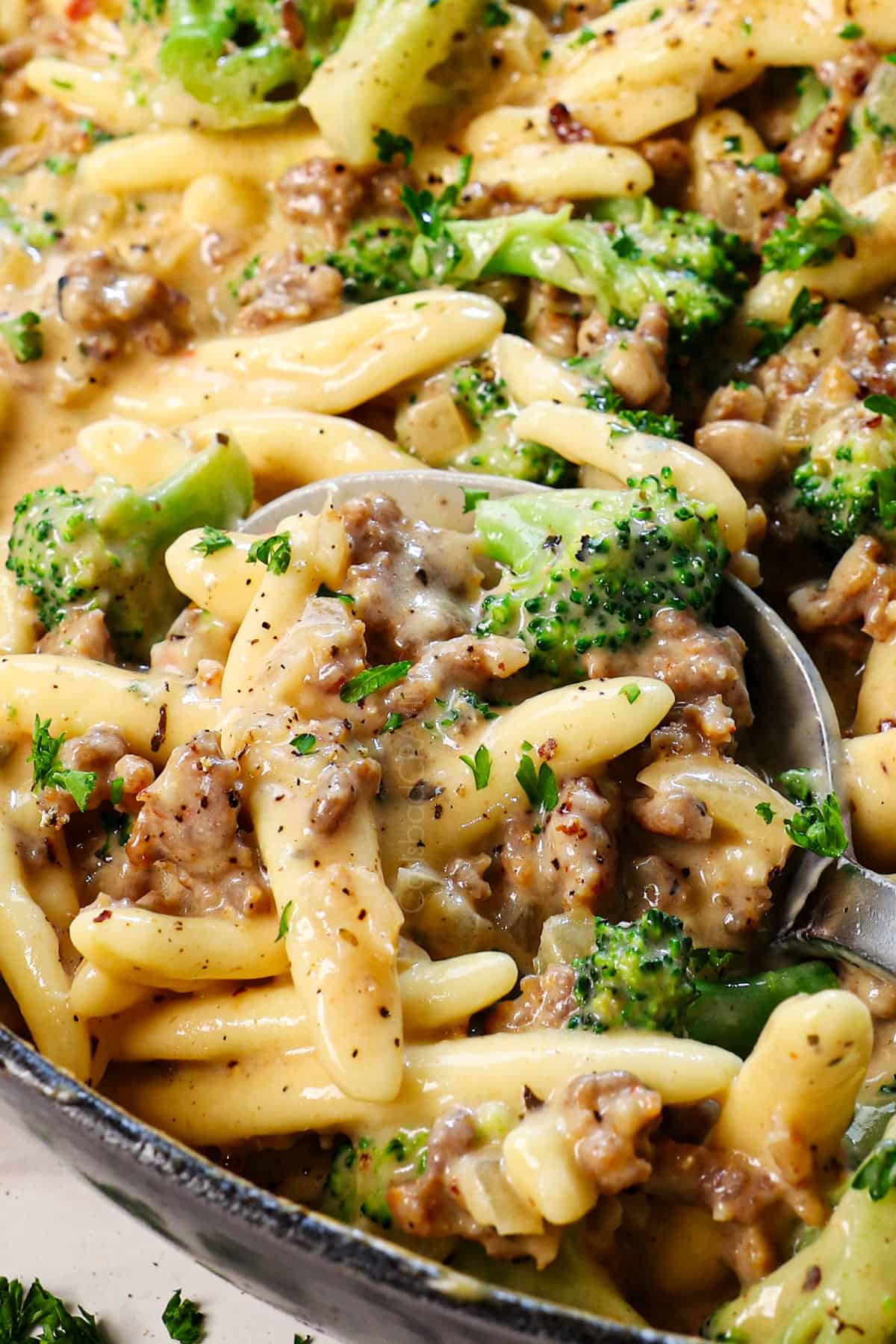 cavatelli recipe with sausage and broccoli in a skillet